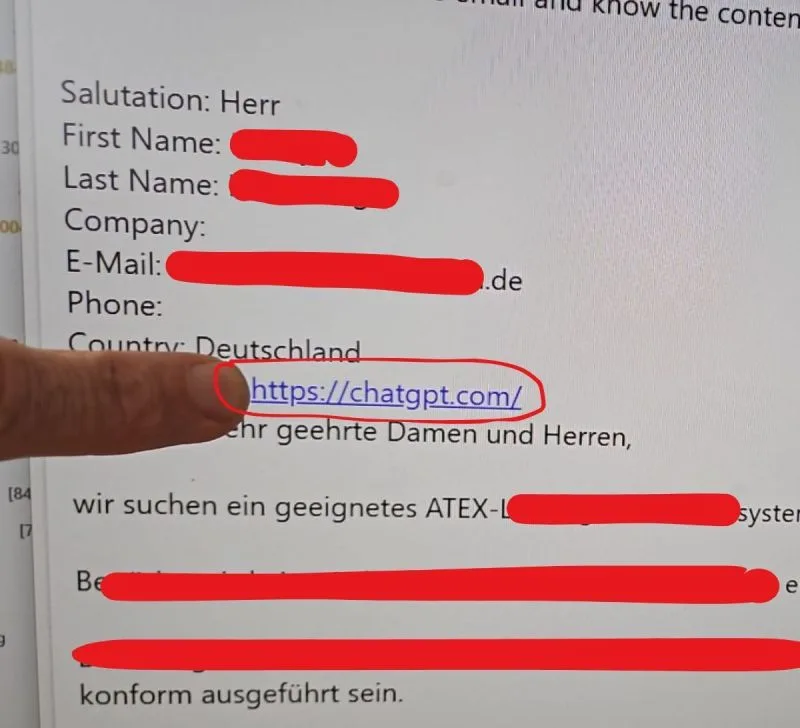 Photo of a German-language contact form with the source chatgpt.com circled in red. The inquiry concerns an ATEX-rated system; personal details are blacked out.